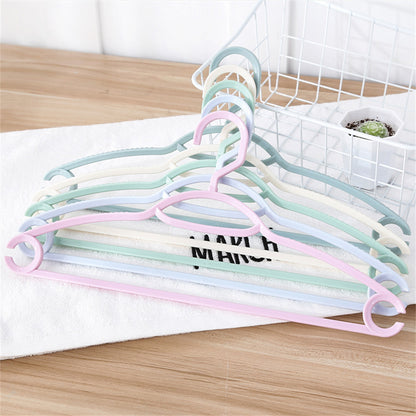 A sturdy home clothes hanger for dorm or student use, non-slip and scratch-free.